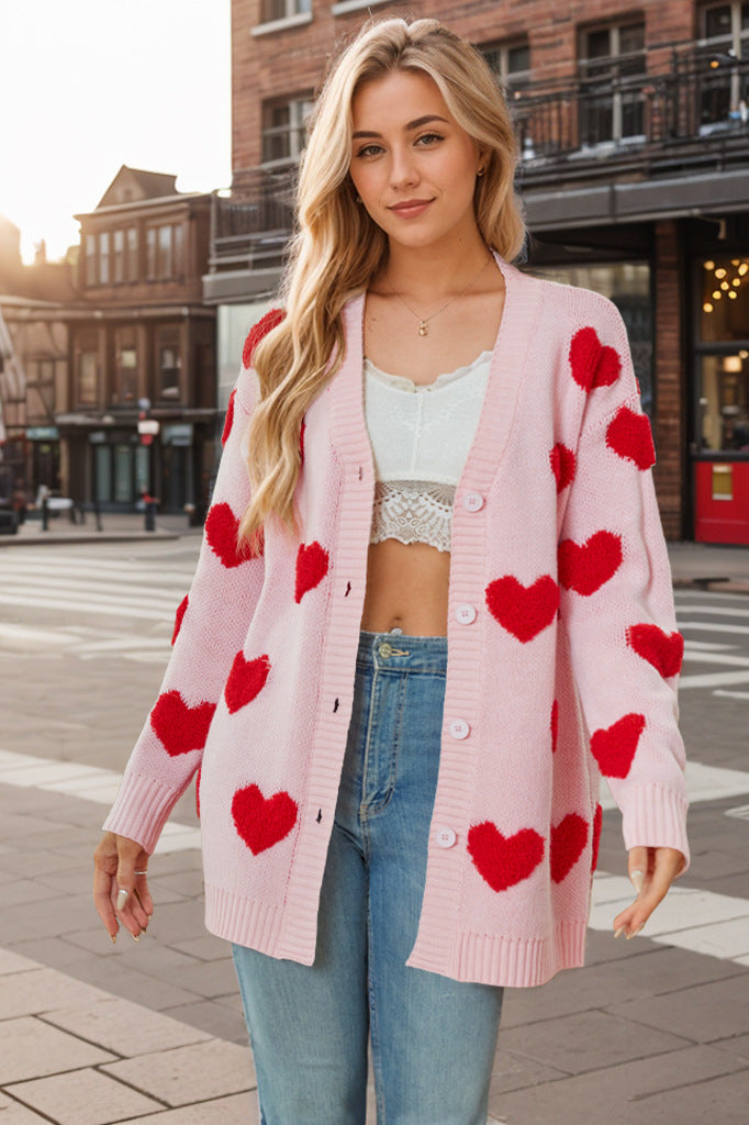 Urban dames vest met all-over hartjesprint, trendy en kleurrijk voor elke casual outfit.