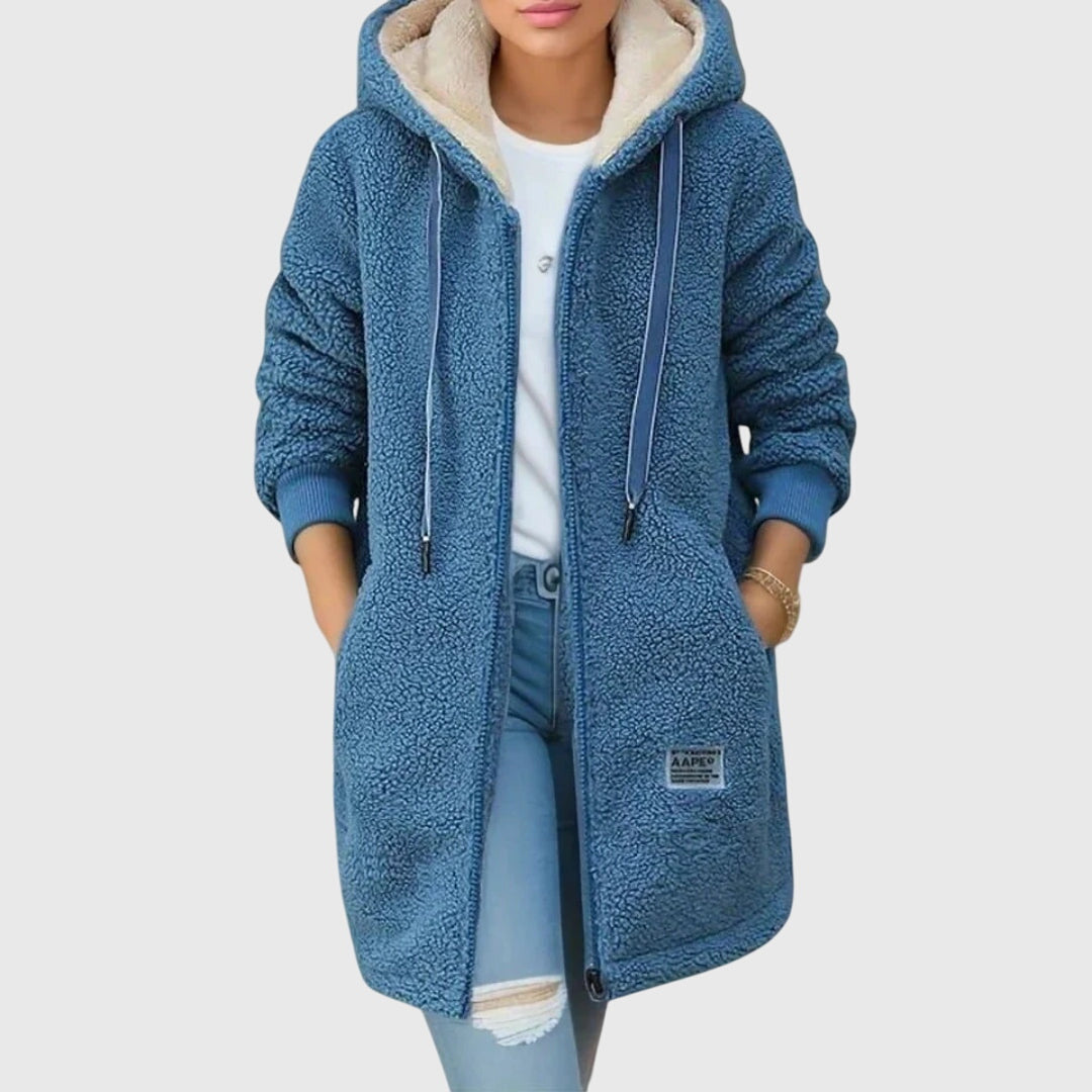 Dames warme lange winterjas met capuchon en rits, ideaal voor koude dagen. Comfortabele casual damesmode.
