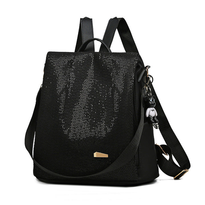 Trendy meerkleurige urban dames rugzak, waterdicht en anti-diefstal, een functionele modeaccessoire.