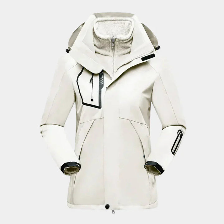 Dames waterdichte winterjas, close-up van de rits en zakken, warm en praktisch outdoor.
