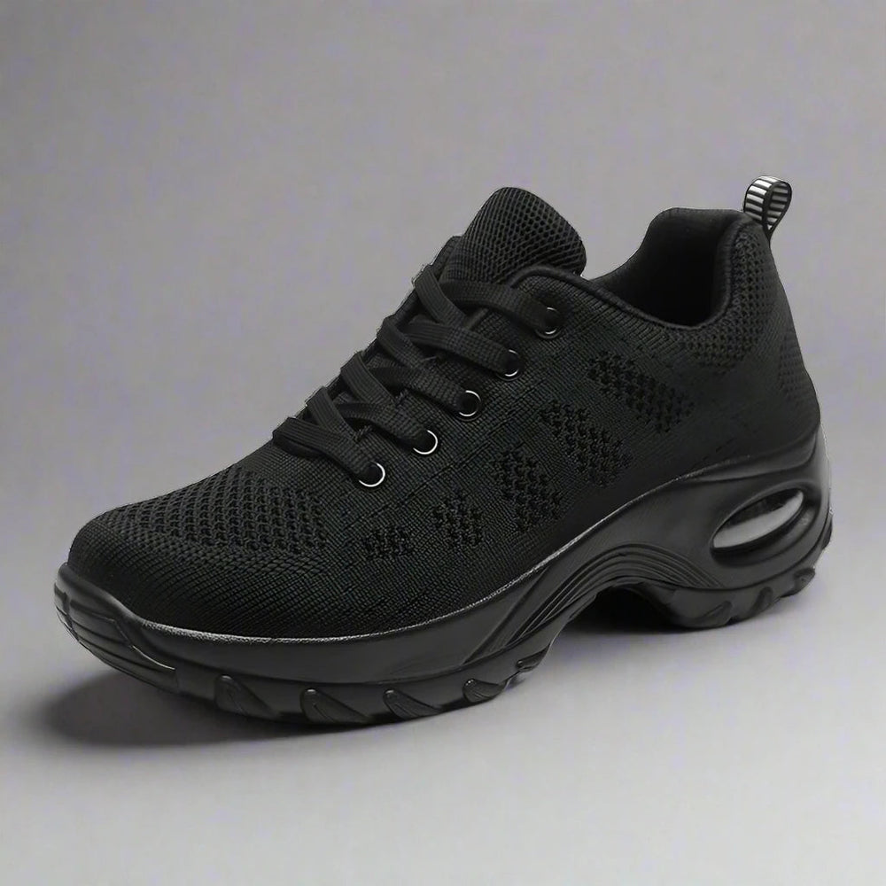 Sportieve witte dames werkschoenen met antislip zool en ergonomische ondersteuning; perfect voor professioneel gebruik.