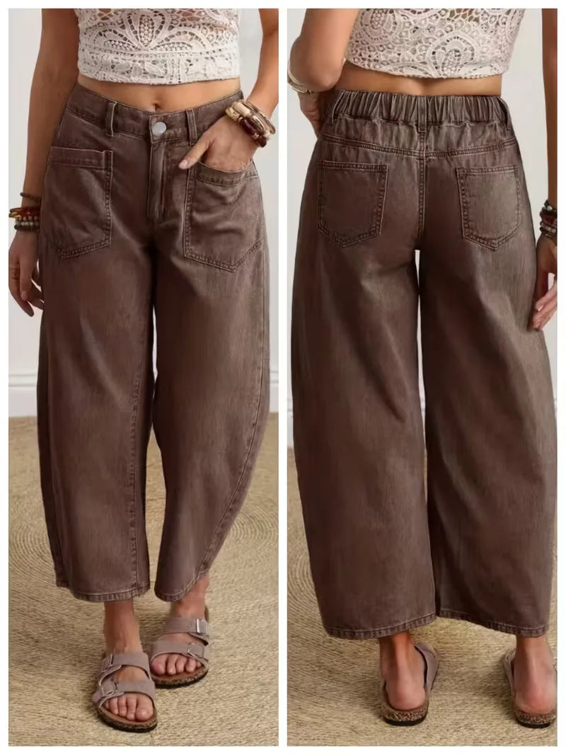 Modieuze dames wide leg broek met comfortabele pasvorm en knoopsluiting, ideaal voor warme dagen.