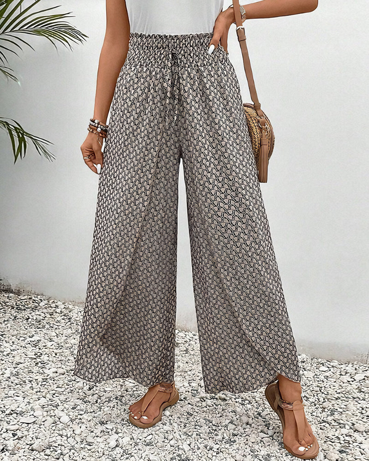 Dames wijde broek met modern geometrisch patroon, ideaal voor chique en comfortabele zomerse dagen.