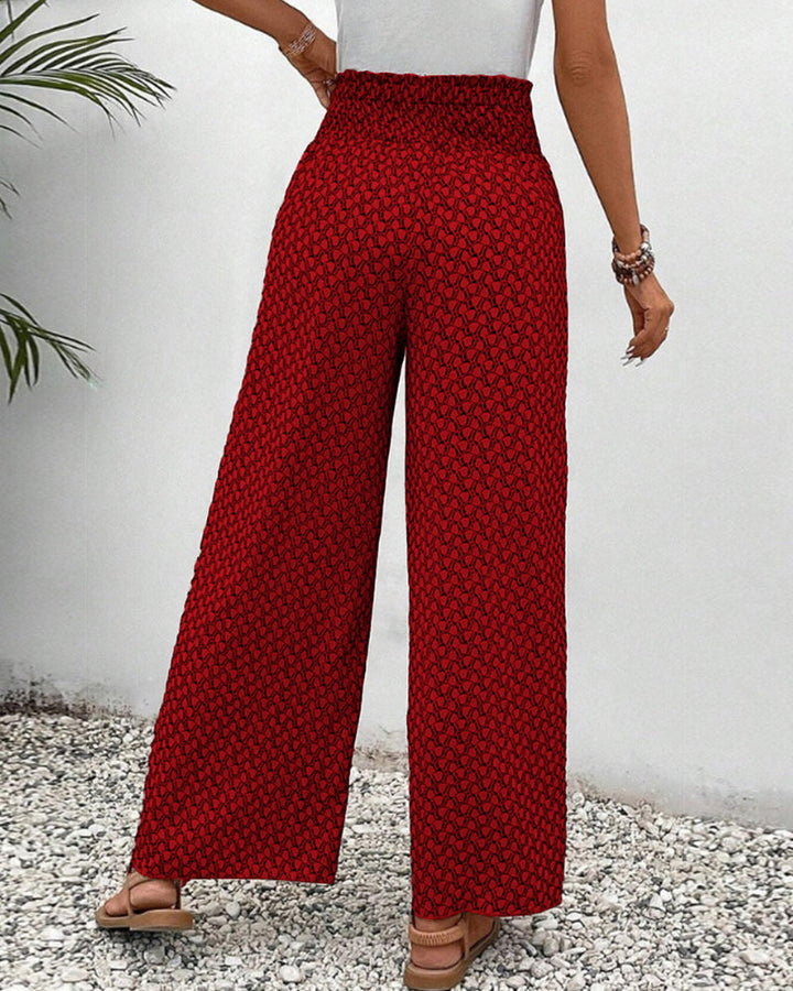 Elegante dames wijde pijpen broek met uniek geometrisch patroon en comfortabele elastische tailleband.