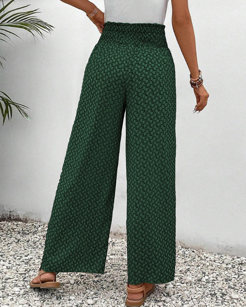 Damesbroek met wijde pijpen en fris geometrisch patroon, comfortabel en modieus, perfect als zomerbroek.