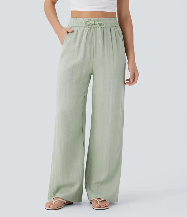 Luchtige dames zomerbroek met wijde pijpen, soepele stof en trekkoord voor ultiem comfort en bewegingsvrijheid.