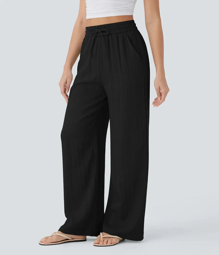 Dames wijde zomerbroek met elastische tailleband en functioneel trekkoord voor een perfecte pasvorm, comfortabel.