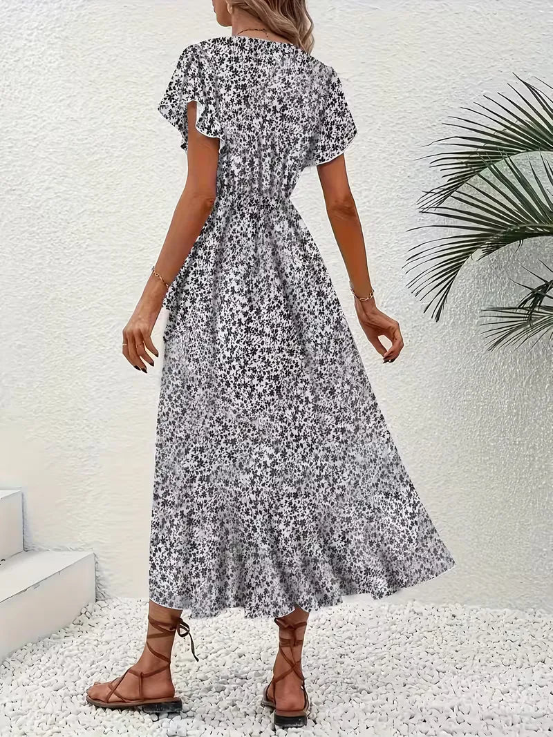 Casual bloemenprint wikkeljurk met V-hals en korte mouwen, perfect voor dames.