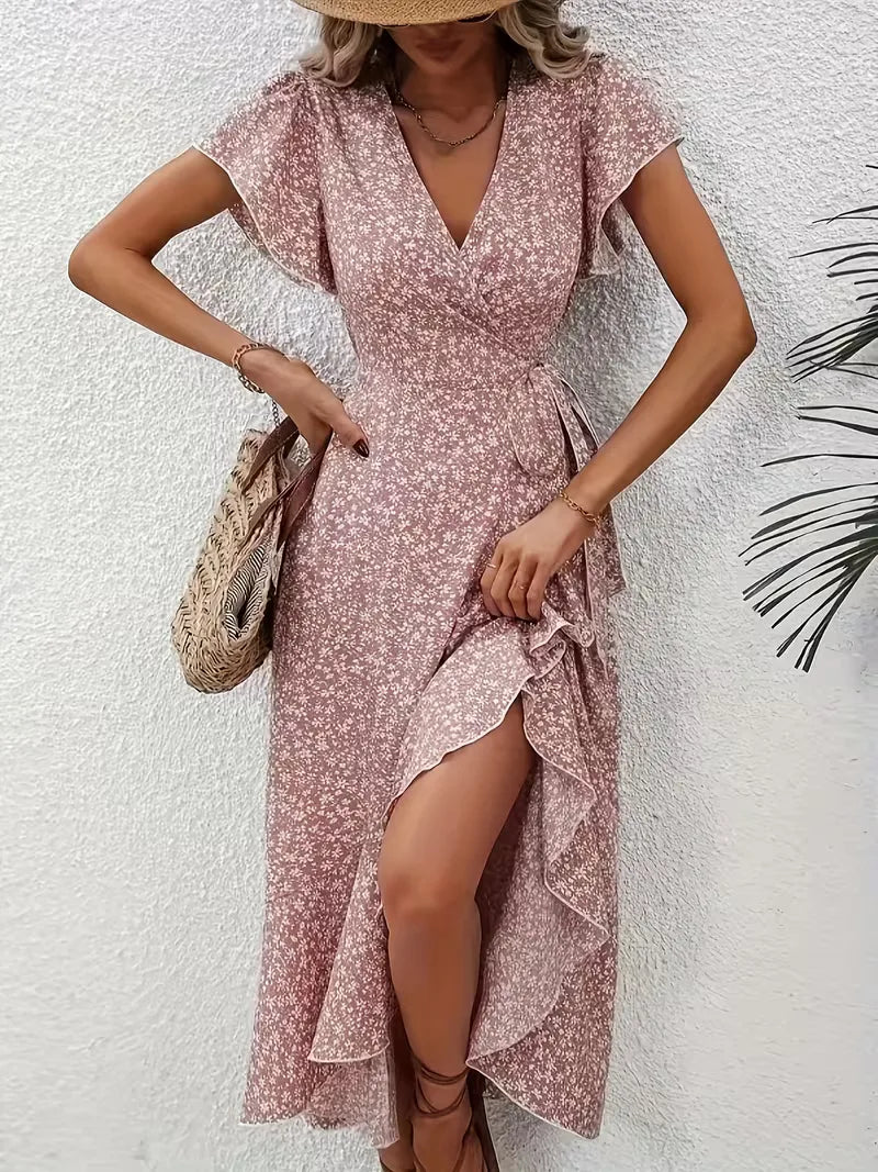 Dames wikkeljurk met zomerse bloemenprint, casual elegantie voor vakantie of vrije tijd.