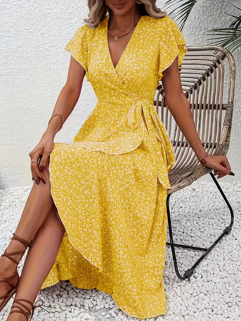 Perfecte zomerjurk: dames wikkeljurk met bloemenprint in boho stijl.