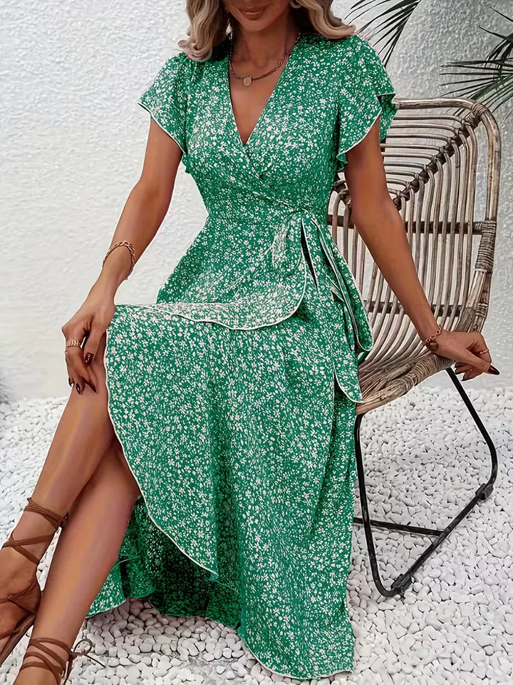Zomerse damesjurk, wikkelmodel met prachtige bloemenprint en boho uitstraling.