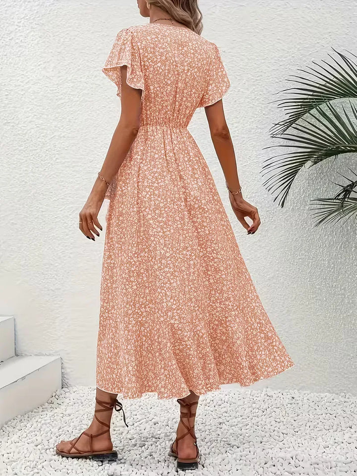 Casual damesjurk: bloemenprint wikkeljurk in zomerse boho stijl, midi lengte.