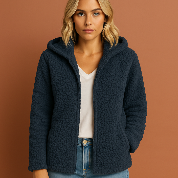 Veelzijdig grijs dames wintervest met rits en capuchon, perfecte kleding voor herfst en winter.