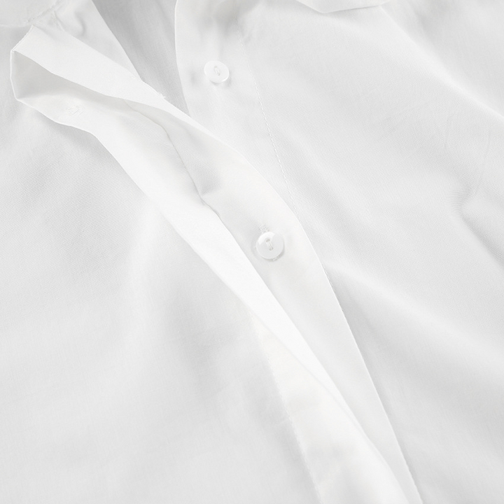 Casual chic wit overhemd met strik, geschikt voor zakelijk en vrije tijd. Comfortabele damesblouse.