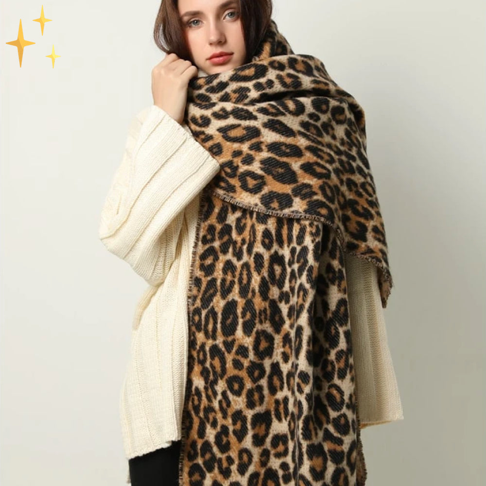 Modieus accessoire: XL dames sjaal van wol met klassieke luipaardprint en subtiele touwdetails.
