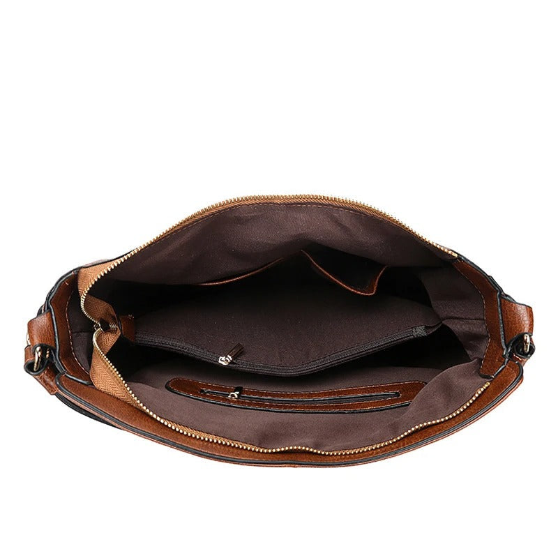 Elegante leren schoudertas voor dames, gemaakt van zacht leer. Ideaal als luxe mode accessoire.