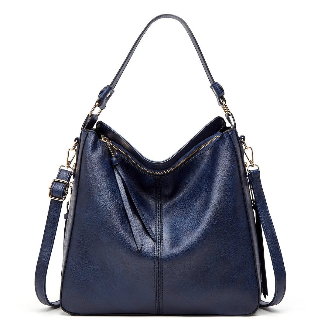 Hoogwaardige zacht leren crossbody tas voor dames, met een luxe uitstraling en praktisch design.