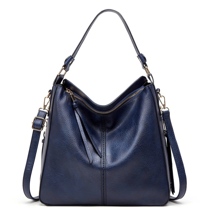 Hoogwaardige zacht leren crossbody tas voor dames, met een luxe uitstraling en praktisch design.