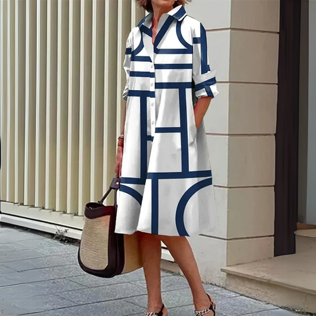 "Dames zomer midi overhemdjurk met knoopsluiting en geometrische print, stijlvol en veelzijdig, ideaal voor zomerse dagen."