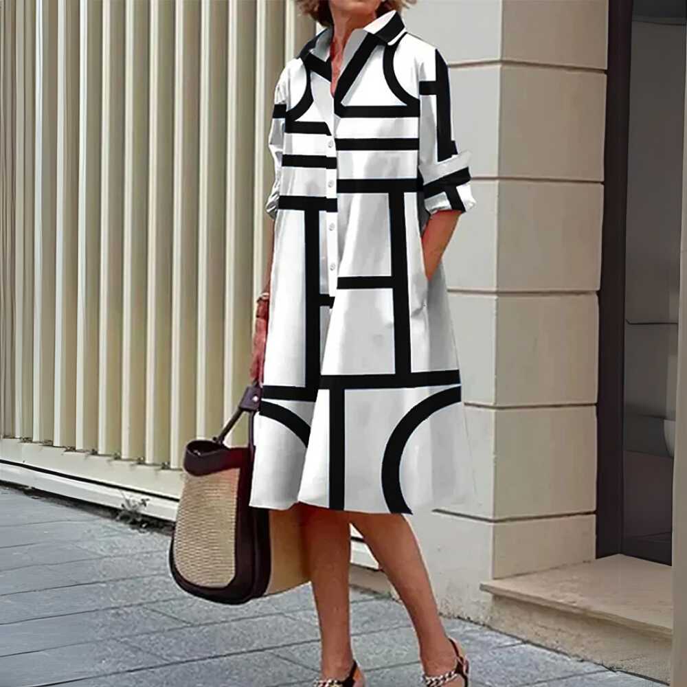 "Dames zomer midi overhemdjurk met knoopsluiting en geometrische print, stijlvol en veelzijdig, ideaal voor zomerse dagen."