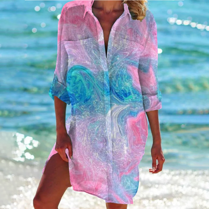 Luchtige katoen/polyester dames jurk, A-lijn model, met kleurrijk design. Ideaal voor warme zomerdagen.