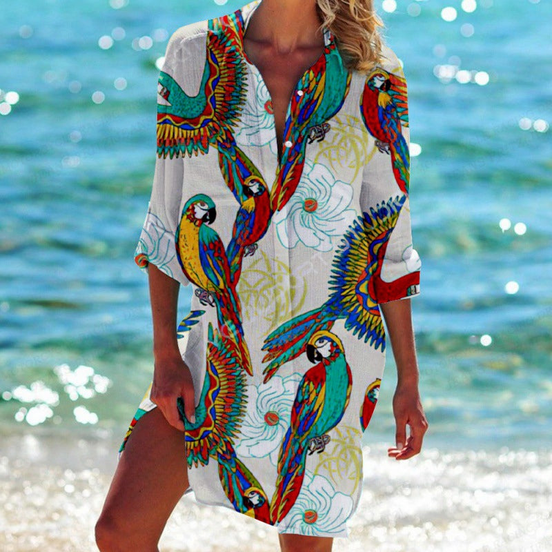 Dames zomerse overhemdjurk met tropische print en A-lijn model, ideaal voor casual dagen of vakantie.