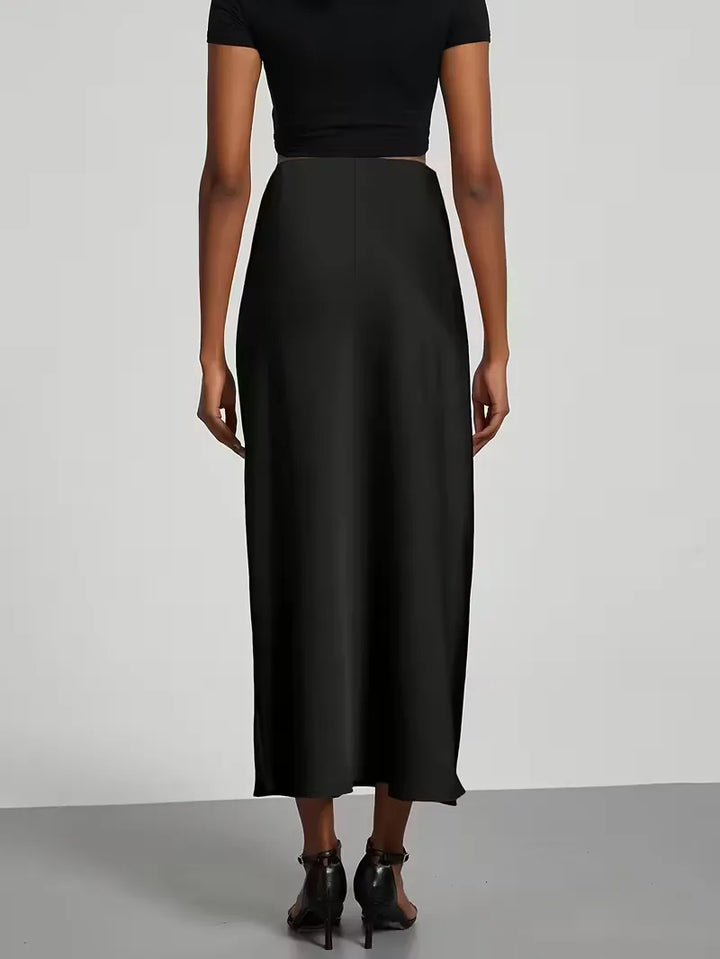 Veelzijdige dames satijnen rok, midi model met flatterende hoge taille, geschikt voor elke look.