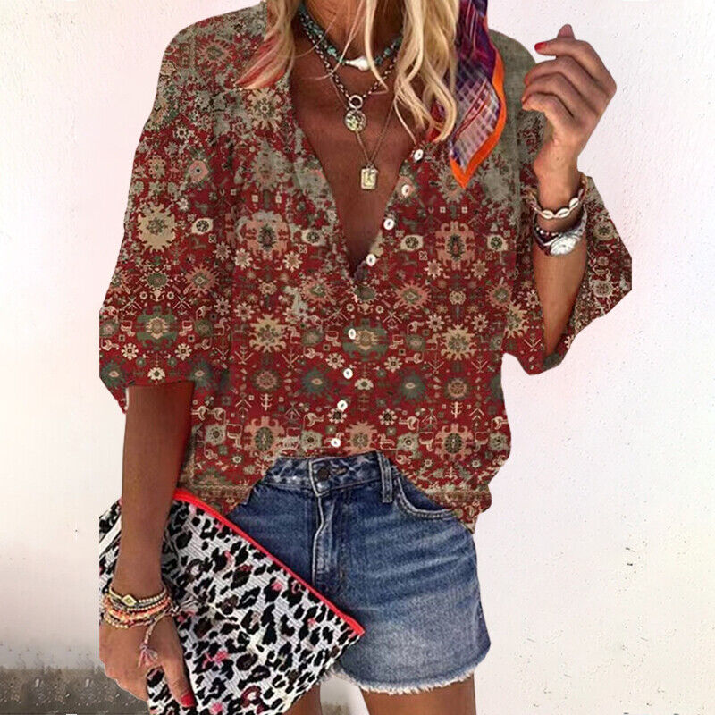 Trendy damesbloes top met bloemenprint en knoopsluiting, veelzijdig te combineren voor een casual of chique look.
