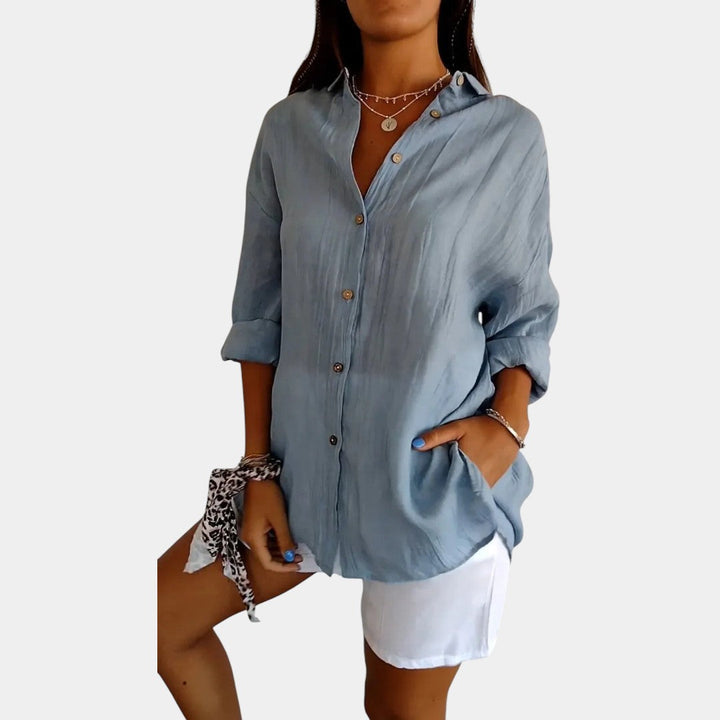 "Damesblouse in ademende katoen-linnenmix, comfortabele pasvorm, geschikt voor werk, casual of avondje uit."