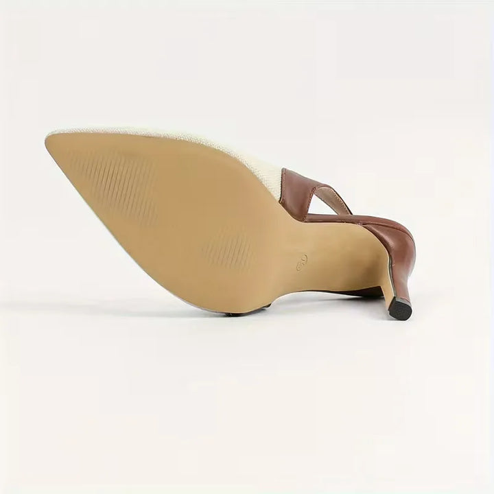 Formele damesstiletto's met puntige neus en hoge hak, ideaal voor een chique avondlook of events.