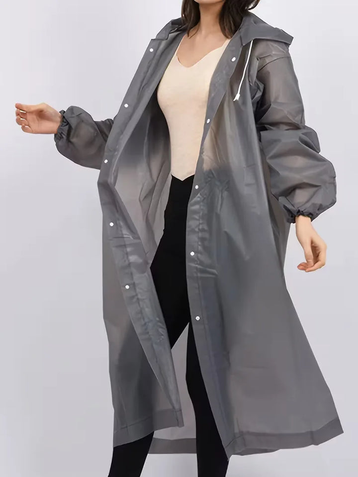 Oversized waterdichte regenjas met capuchon voor optimale bescherming, donkergrijs, perfect voor casual outdoor gebruik.