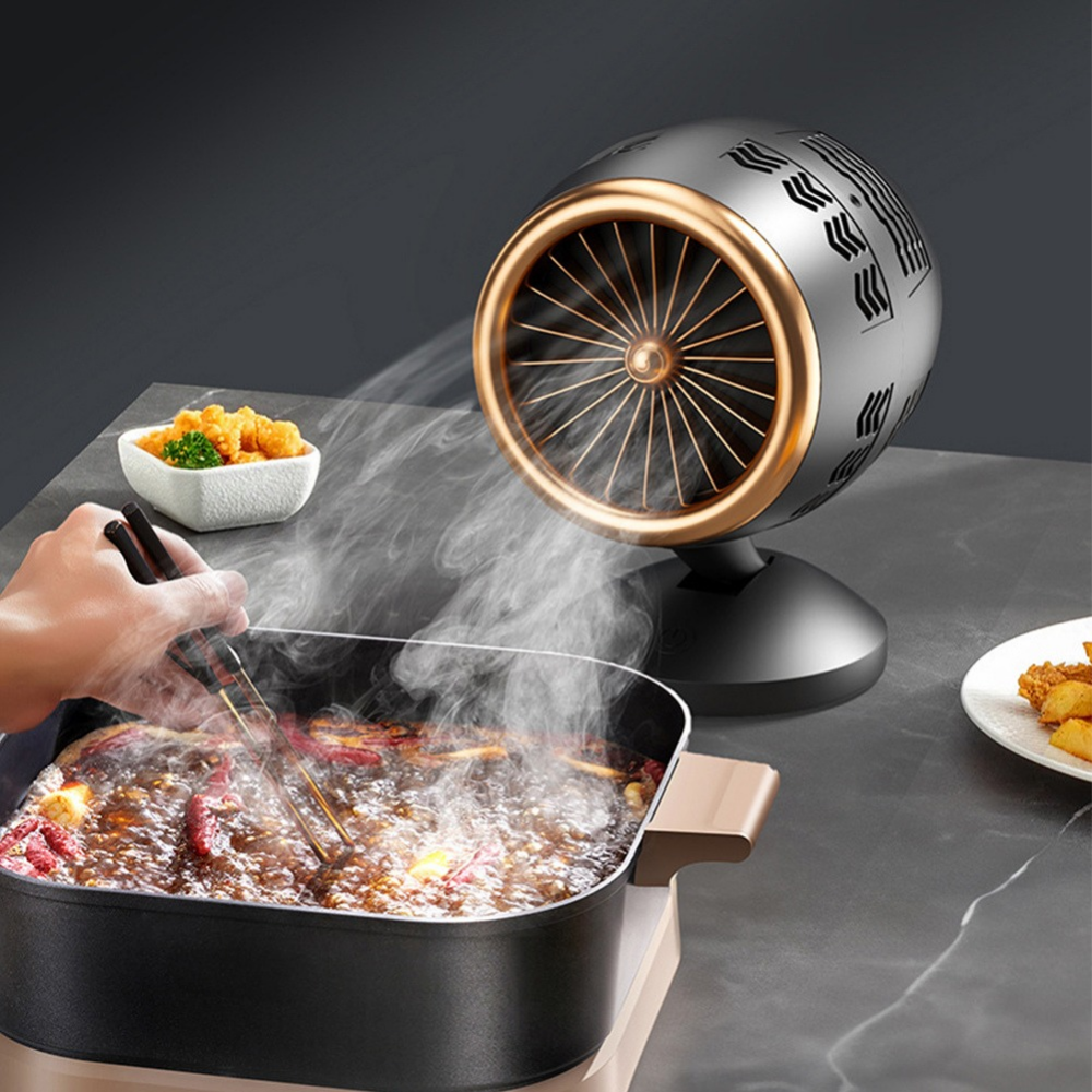 Compacte tafelmodel rookafzuiger met USB-voeding, perfect voor keukenventilatie en geurverwijdering tijdens het koken.