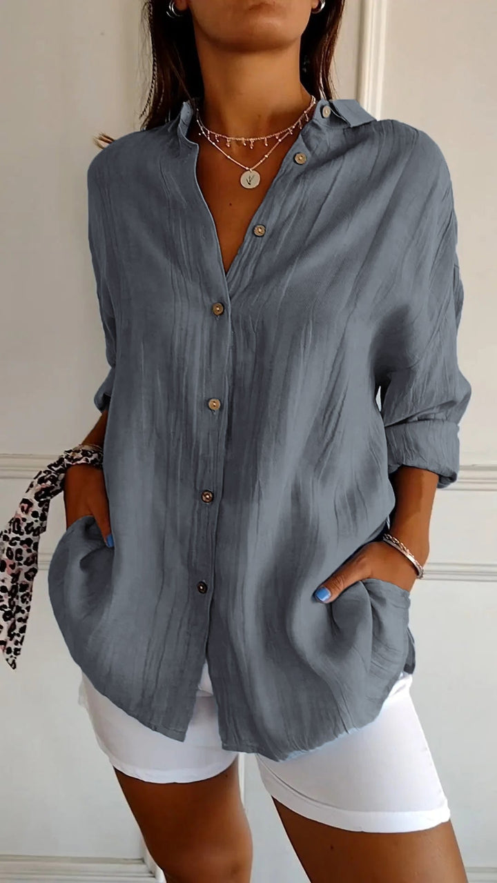 Dames overhemd met plooien, lange mouw. Elegant en comfortabel voor zowel zakelijk als casual.