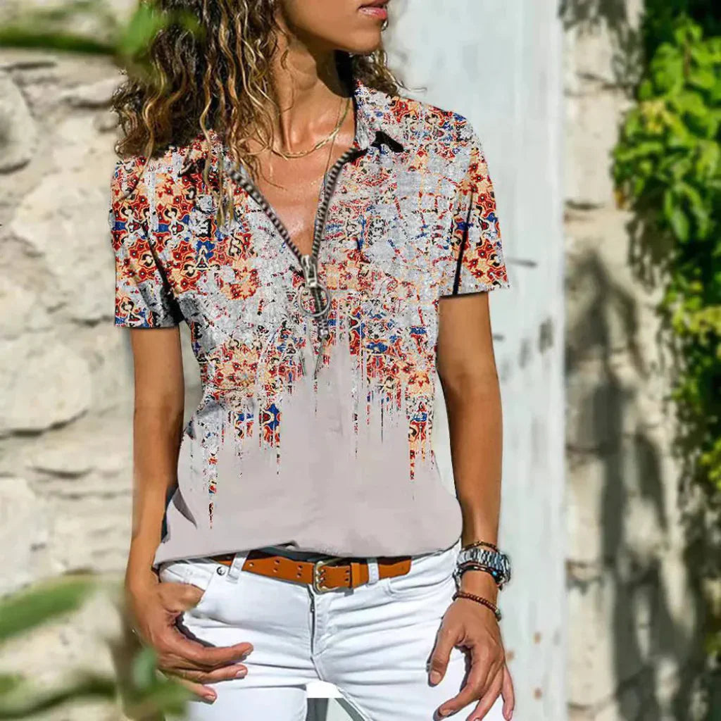 Elegant dames zomershirt in paars, luchtige stof, subtiele pofmouwen, moderne pasvorm, perfecte zomerlook.