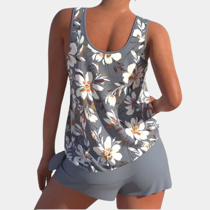 Zomerklaar eendelig zwempak Celestia voor vrouwen, elegant en tijdloos voor een stijlvolle dag aan zee.