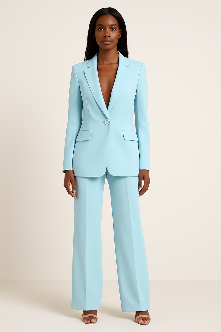 Elegant damespak met getailleerde blazer en rechte broek, ideaal voor een stijlvolle zakelijke look of avondgelegenheid.