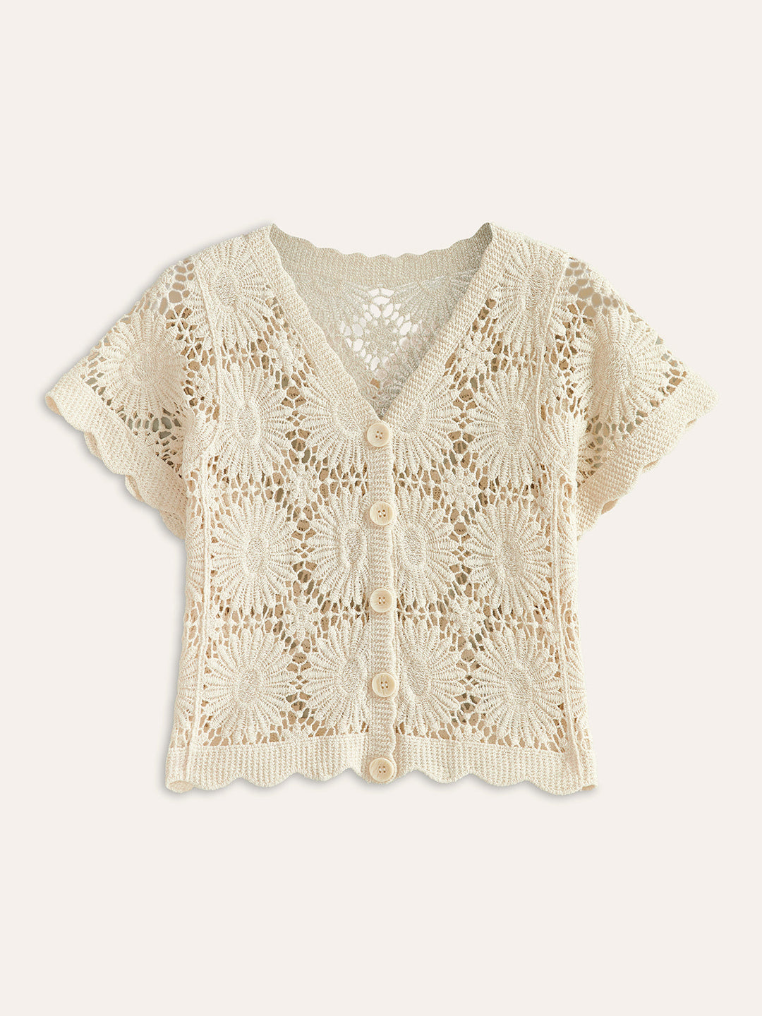 Elegant damesvest met bloemenpatroon en knoopsluiting, perfect voor tussenseizoen mode.