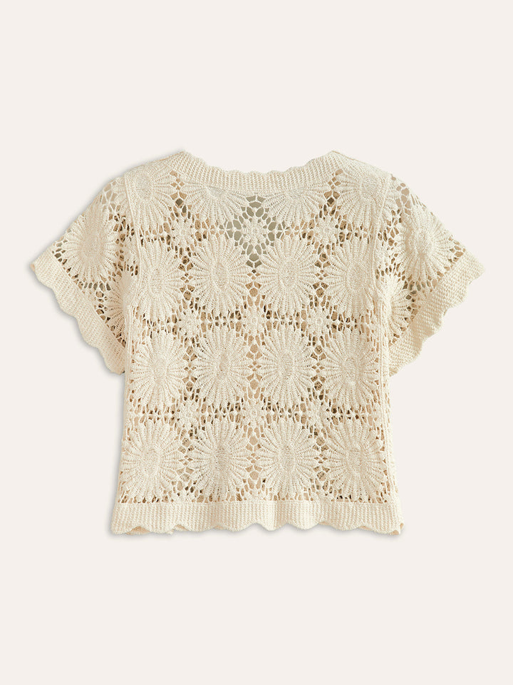 Stijlvol damesvest met kleurrijk bloemenpatroon en knoopsluiting. Casual én elegant voor lente/herfst.