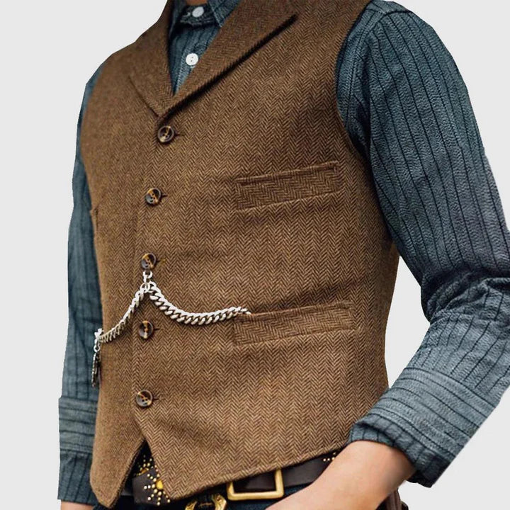 "Elegant heren gilet met klassiek visgraatpatroon en verfijnde knoopsluiting, perfect voor zowel zakelijke als casual gelegen