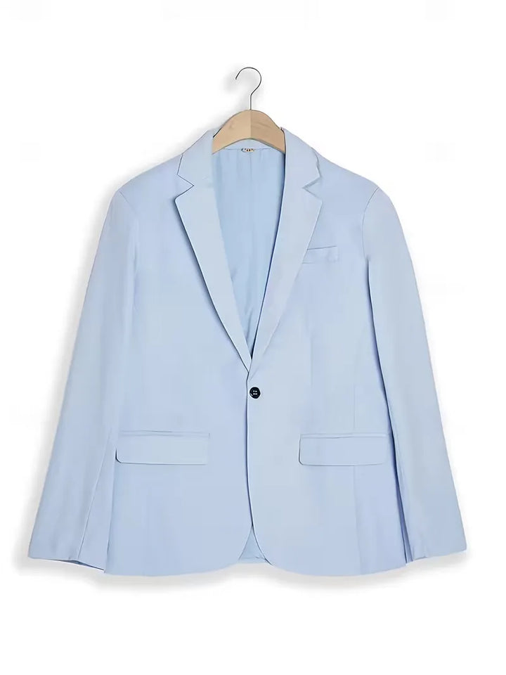 Beige slim fit herenpak met getailleerde blazer en pantalon, ideaal voor formele lente- en zomerfeesten.