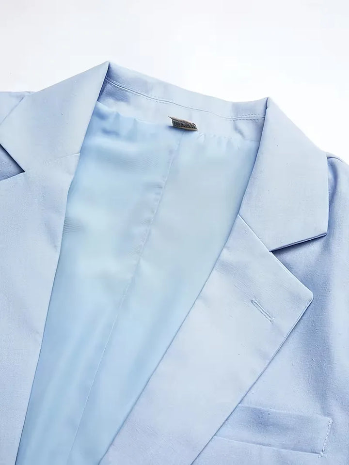 Zakelijk lichtblauw slim fit herenpak met een frisse, moderne uitstraling voor de zomermaanden.