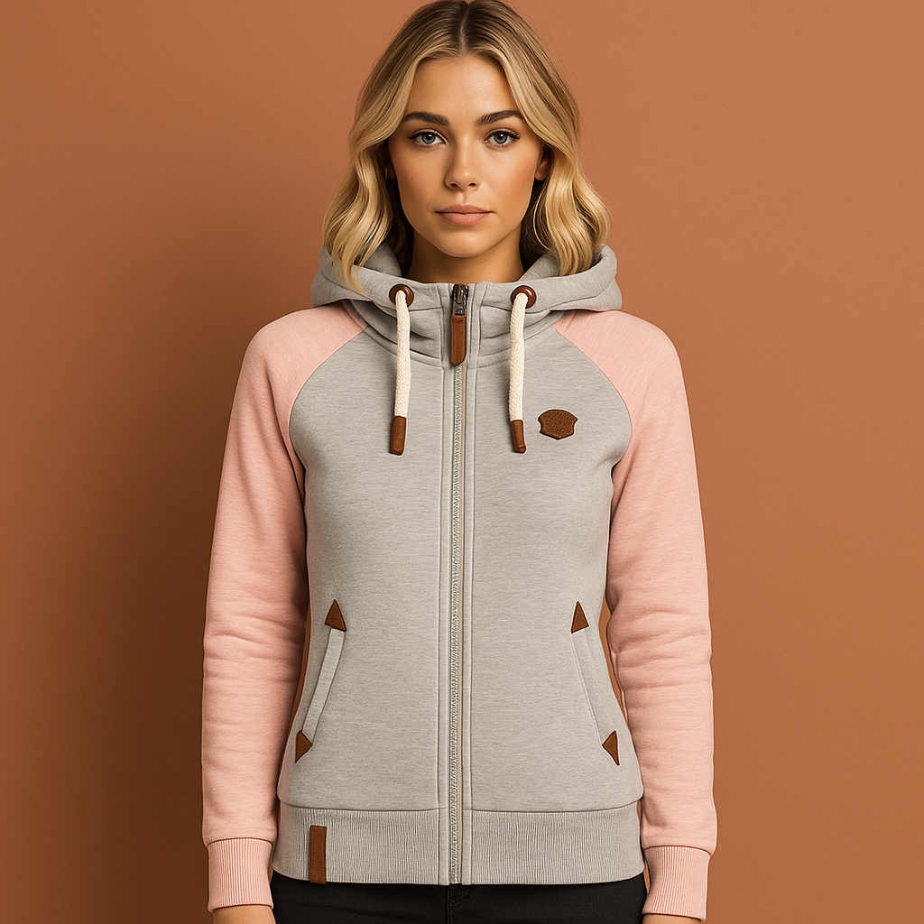 Zacht lichtroze damesvest met rits. Comfortabel en modern, perfecte losse pasvorm voor vierseizoenen stijl.
