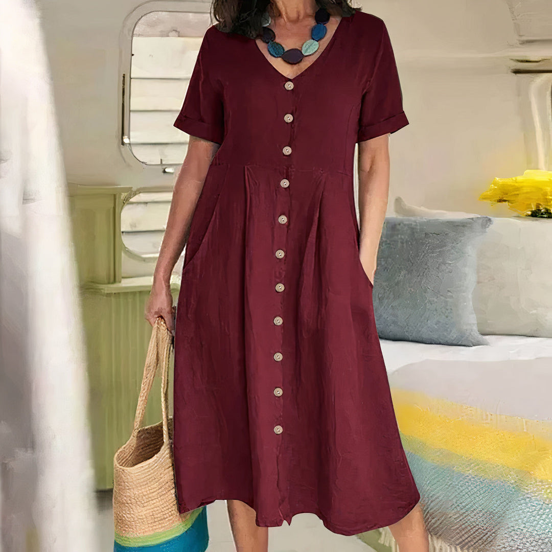 Elegante A-lijn midi zomerjurk voor dames met comfortabele V-hals en praktische zakken.