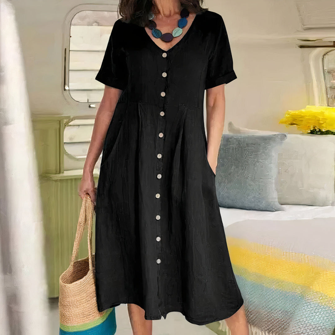 Zomerse dames midi jurk met elegante V-hals en comfortabele A-lijn pasvorm.