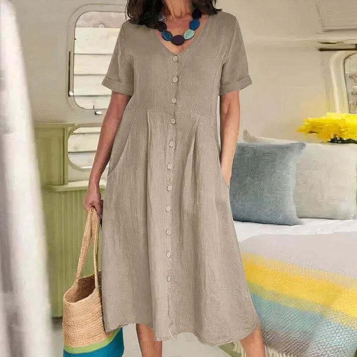 Elegante dames V-hals midi jurk, perfect als zomerjurk, beschikbaar in diverse maten S t/m 5XL.