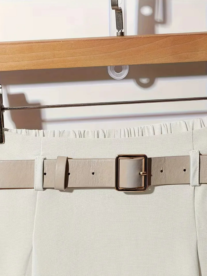 Beige dames plooirok, hoge taille midirok, ideale zomerrok voor een casual of elegante look.
