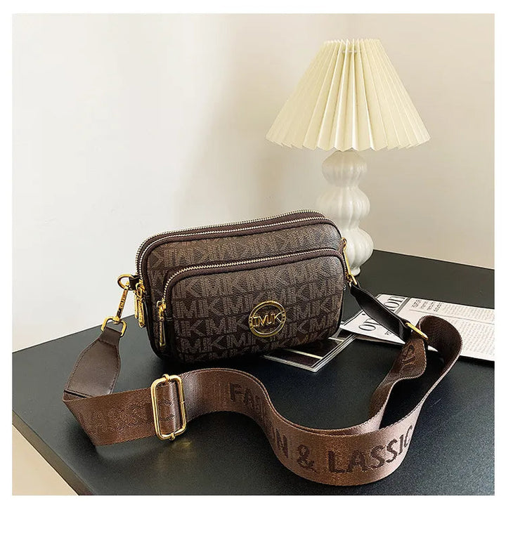 Schoudertas voor dames in beige met subtiele merkdetails, een tijdloos fashion statement.
