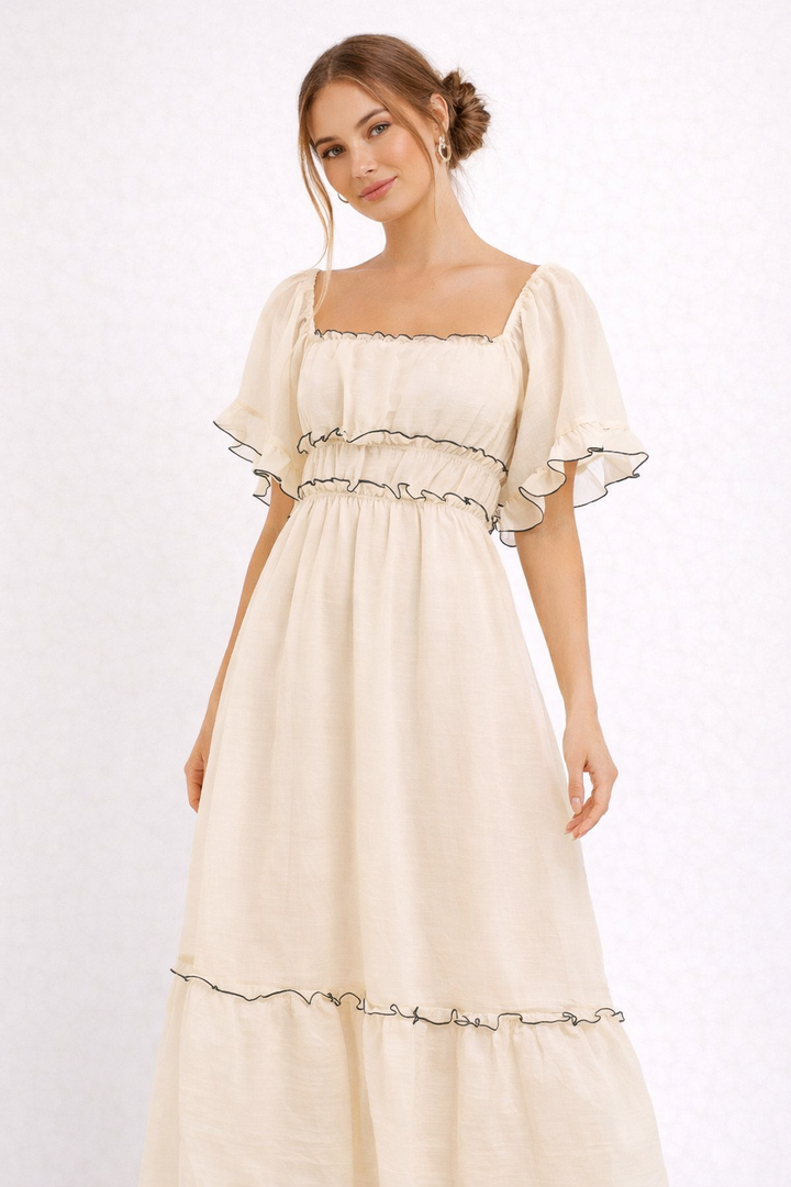 Elegante beige midi-jurk voor dames met romantische ruches; comfortabel en perfect voor zomerse dagen.