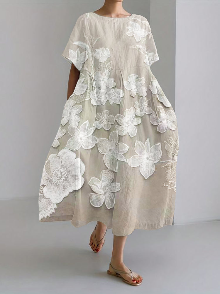 "Elegante bloemenjurk met relaxed fit, subtiele bloemenprint en luchtig ademend materiaal voor comfortabele casual stijl."