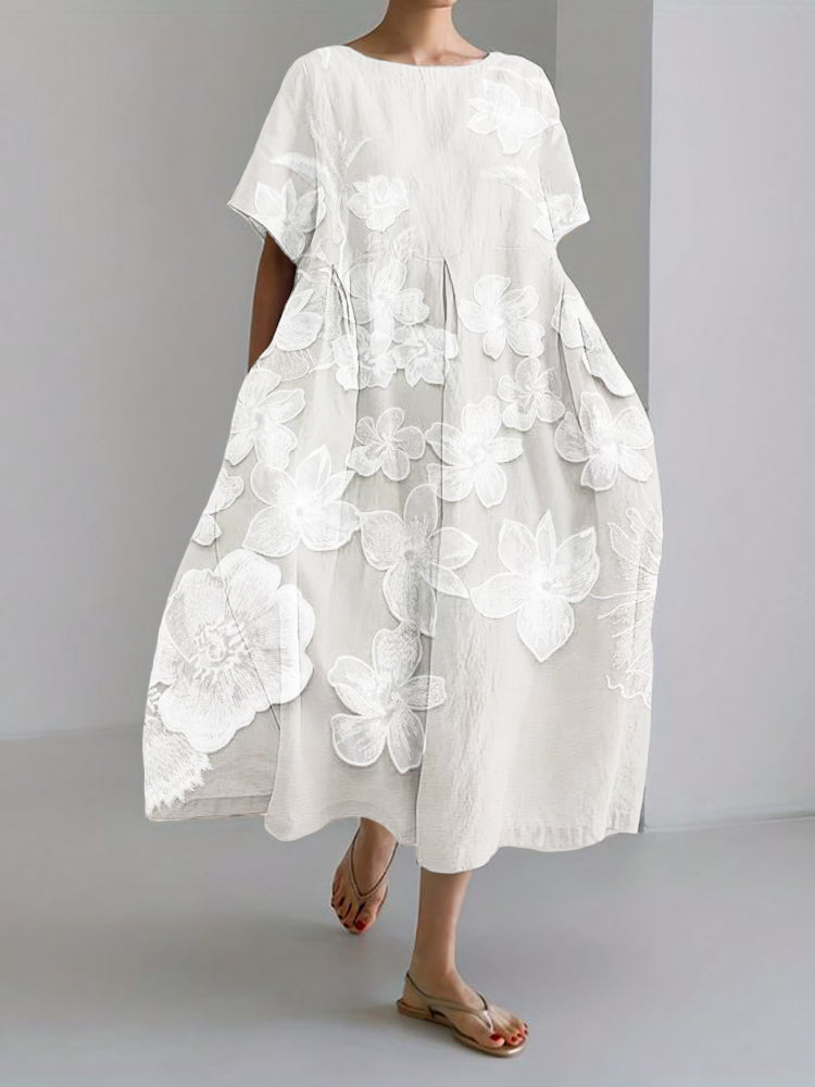 "Elegante bloemenjurk met relaxed fit, subtiele bloemenprint en luchtig ademend materiaal voor comfortabele casual stijl."